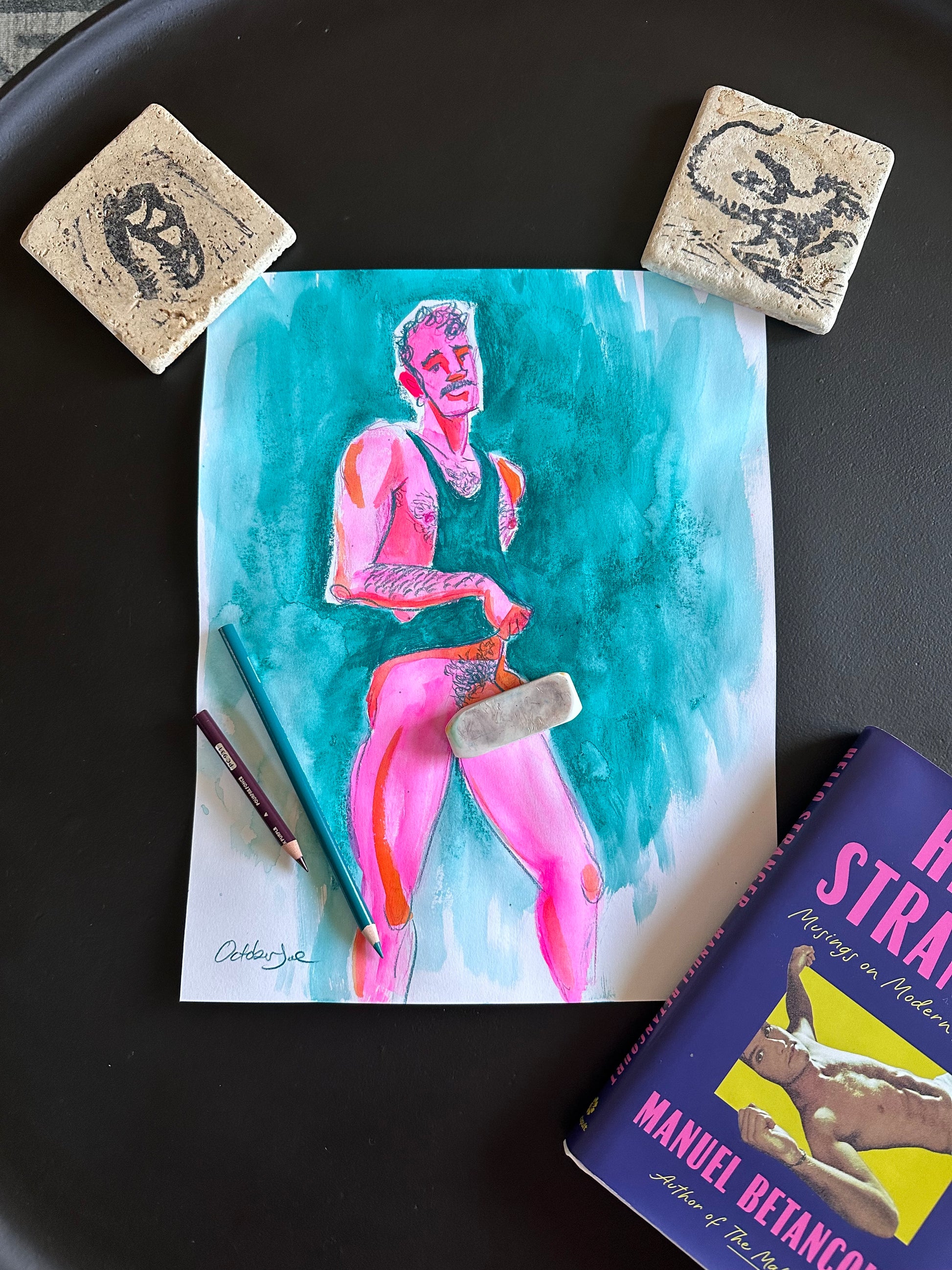 Artistic depiction of a person on a book with two stamps and a book titled 'The Stranger' on a black surface.